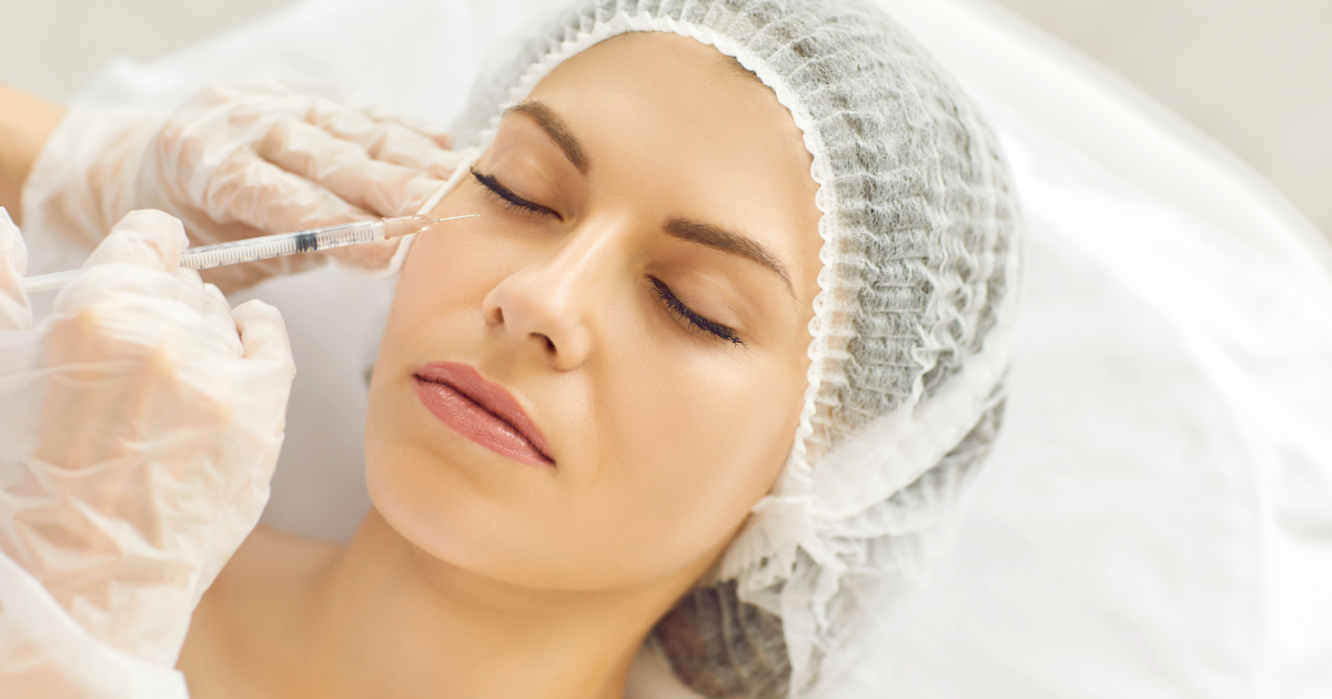 Woman receiving PRF injection near eye at a clinic in Tulsa, OK, for skin rejuvenation