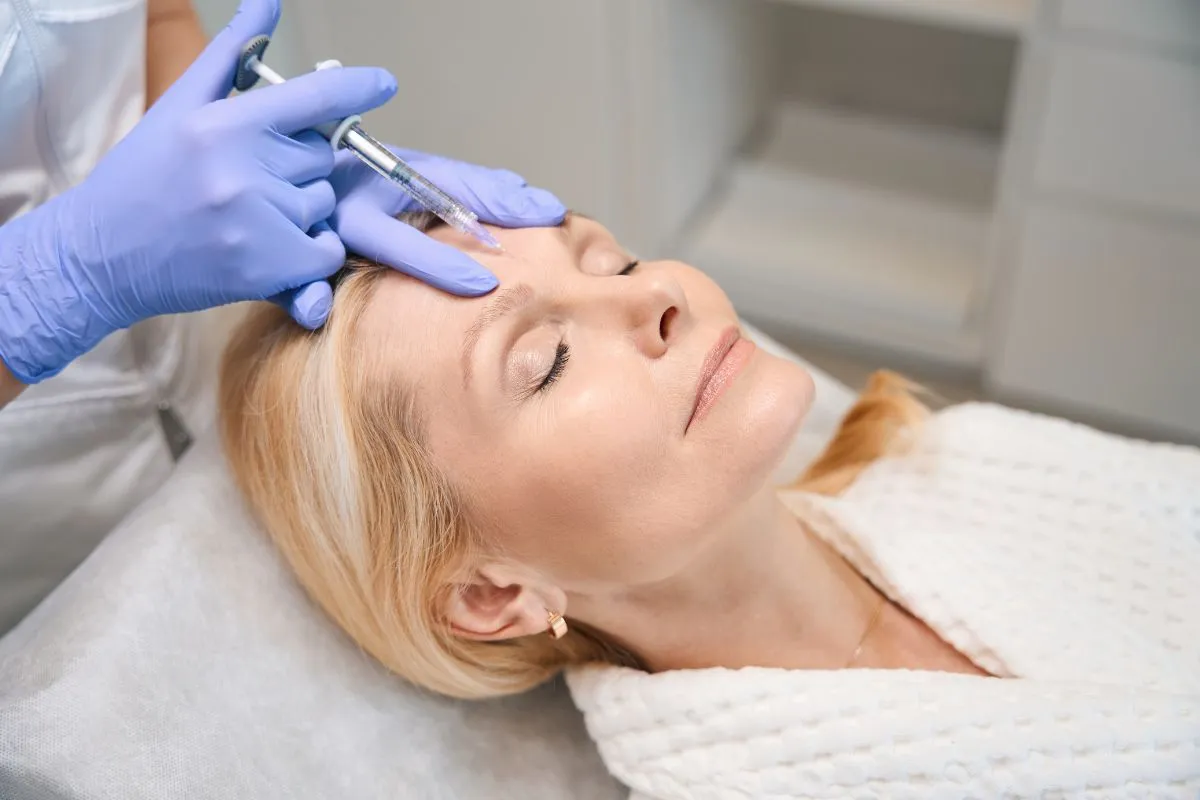 A woman in Tulsa, OK receiving facial PRF Injections for skin rejuvenation