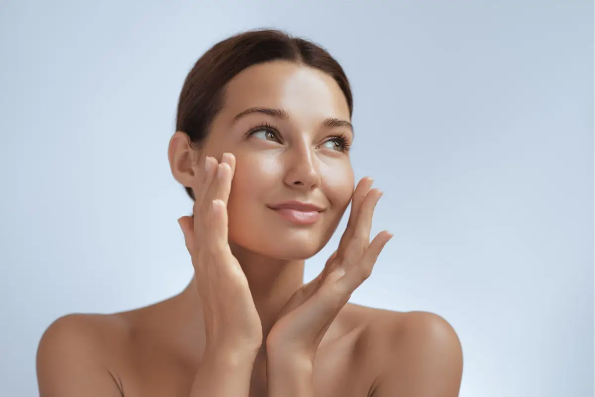 Woman showing facial contour improvement after Sculptra in Tulsa, OK